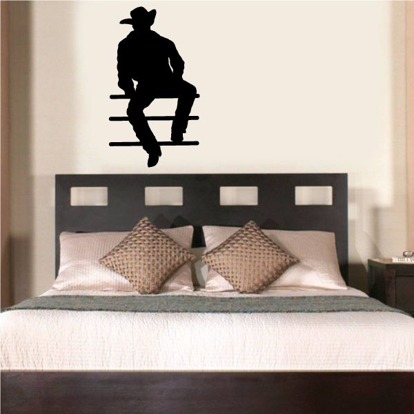 Cowboy wall decal of a standing silhouette with boots and hat, black