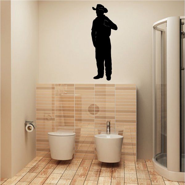 Black cowboy silhouette vinyl wall decal of standing cowboy with hat