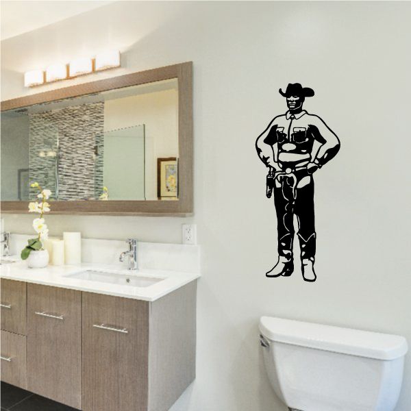 Cowboy wall decal vinyl of a black-outlined cowboy standing with hands on hips