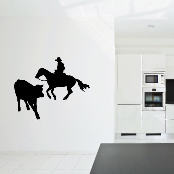Cowboy on horseback vinyl wall decal with cattle silhouette, black