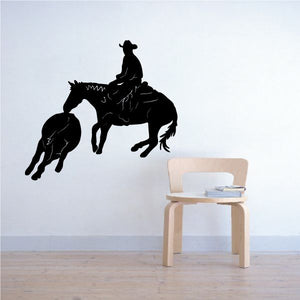 Black cowboy riding horse vinyl wall decal with lasso and spurs silhouette