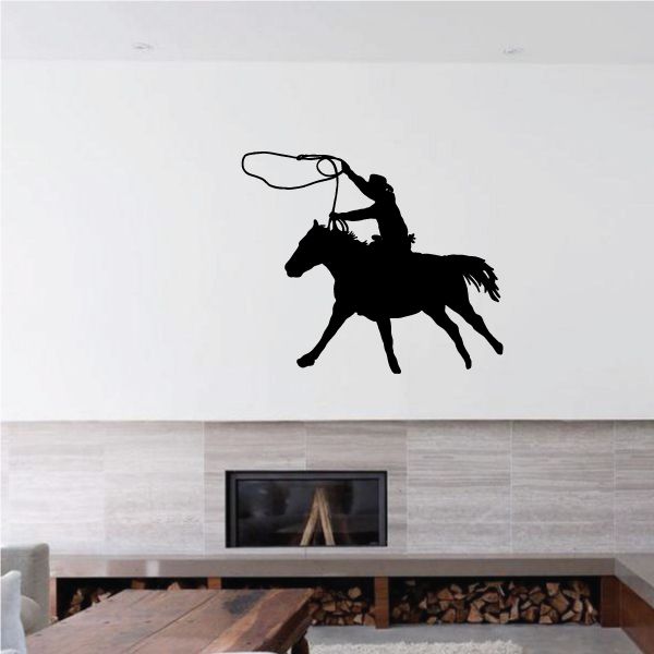 Black cowboy on horseback vinyl wall decal silhouette