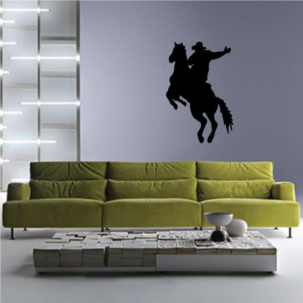 Black cowboy on horseback wall vinyl decal