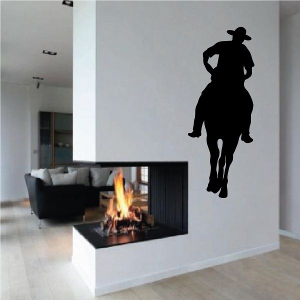 Cowboy on horse vinyl wall decal silhouette