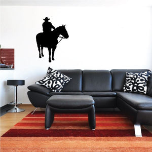 Cowboy on horseback vinyl wall decal, black silhouette