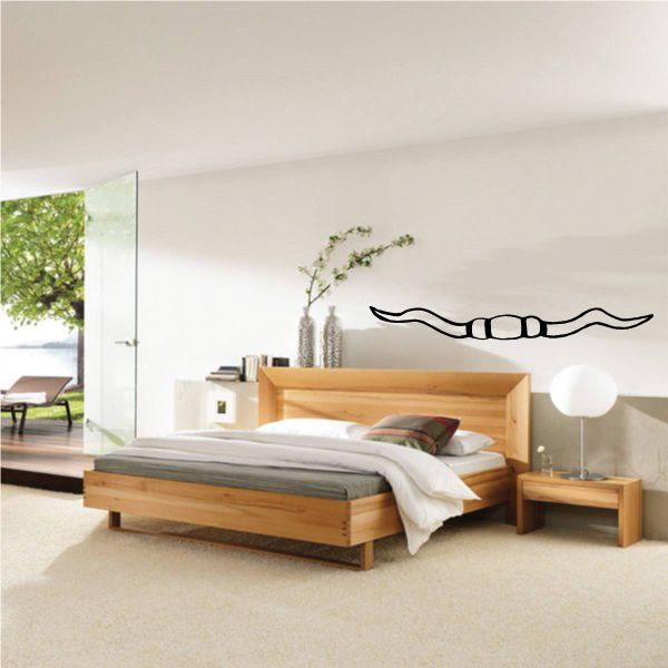 Black vinyl cowboy hat wall decal with wavy brim lines