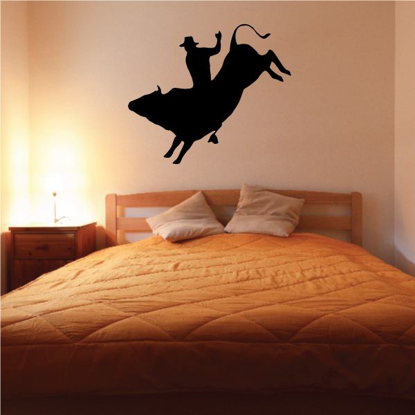 Cowboy wall decal with black horse rider silhouette, vinyl sticker
