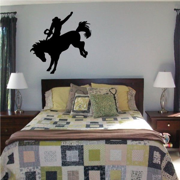 Cowboy on horseback vinyl wall decal, black silhouette