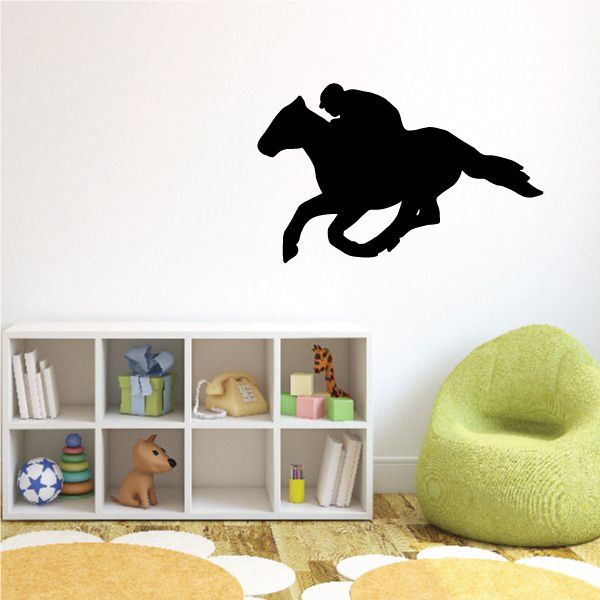 Vinyl cowboy wall decal, black silhouette on wall.