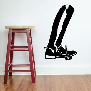Black cowboy boot wall decal with crossed laces and spur details