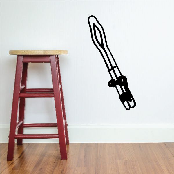 Black cowboy revolver wall decal outline with trigger detail