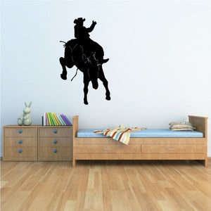 Black cowboy on horse vinyl wall decal