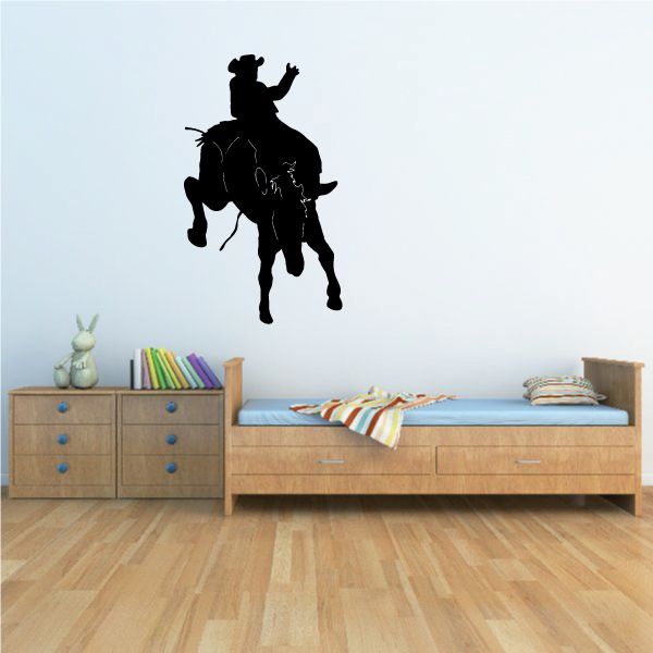Black cowboy on horse vinyl wall decal