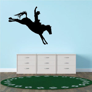 Cowboy wall decal vinyl: black cowboy on horseback silhouette