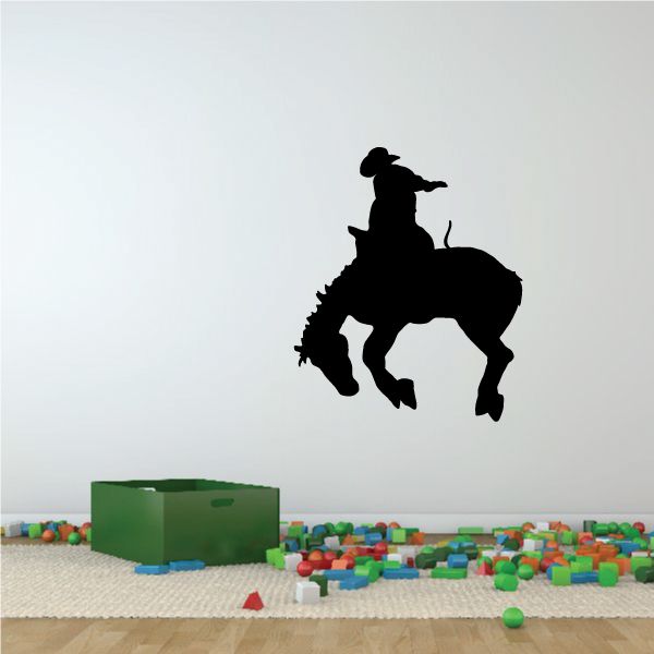 Cowboy on horseback vinyl wall decal, black silhouette