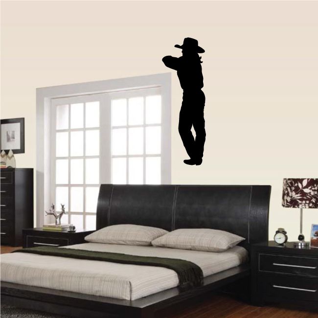 Black cowboy silhouette vinyl wall decal