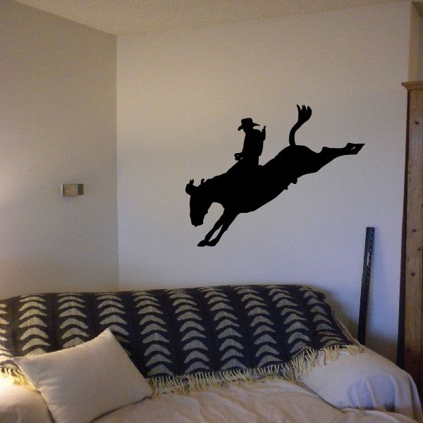 Black cowboy on horseback vinyl wall decal silhouette