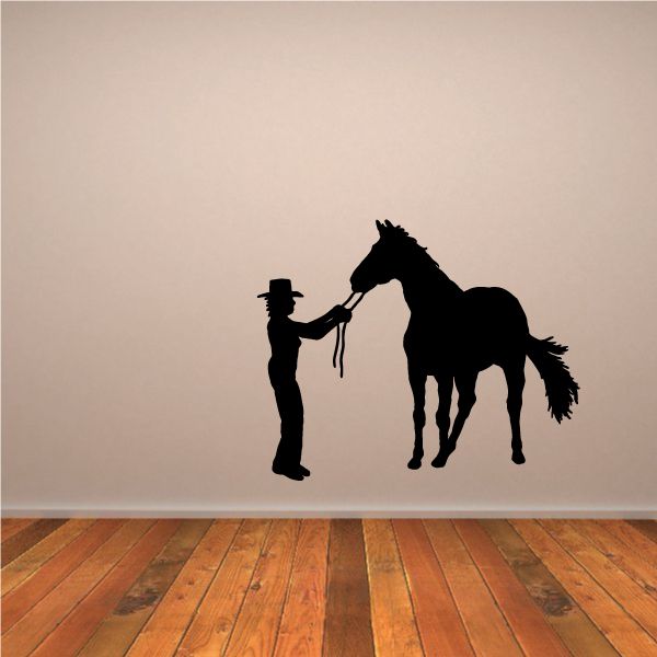 Cowgirl and horse vinyl wall decal silhouette, woman holding rope to a horse
