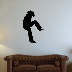 Cowgirl wall decal vinyl silhouette of a hat-wearing rider in black