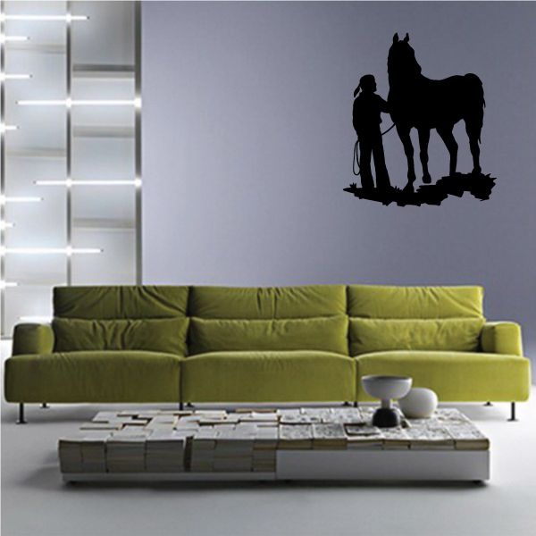 Cowgirl on horse wall decal, black vinyl silhouette.