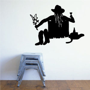 Black cowgirl wall decal silhouette with hat and boots, western riding pose.