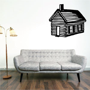 Black log cabin wall decal with striped roof and window details