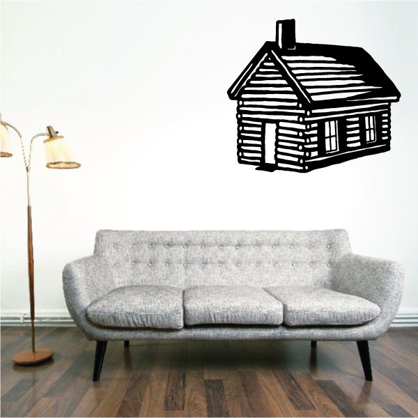 Black log cabin wall decal with striped roof and window details