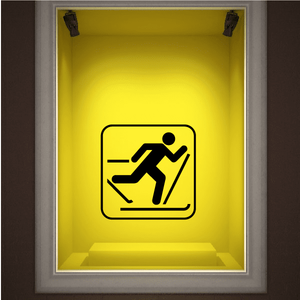 Cross country ski decal with black skier icon on yellow square