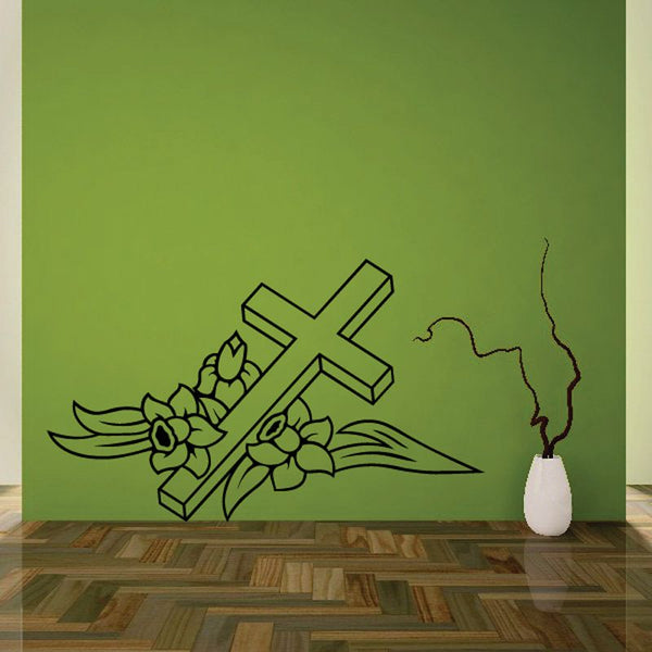 Decorative cross wall decal with flowers, leaves, and ribbon-like accents