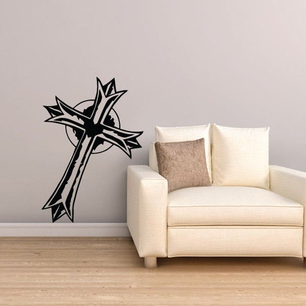 Black cross and sun wall decal with starburst rays