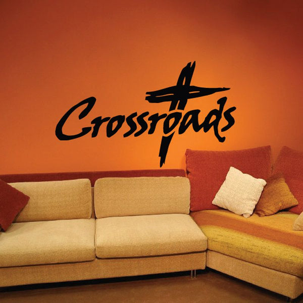 Crossroads decal with script logo and airplane cross design