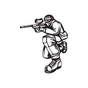 Paintball player decal, crouching kneel pose holding marker gun, black outline