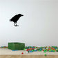 Black crow raven silhouette wall decal, bird standing with wings folded.