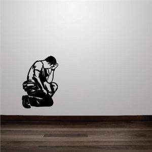 Crying soldier wall decal, kneeling figure with head in hands, black silhouette