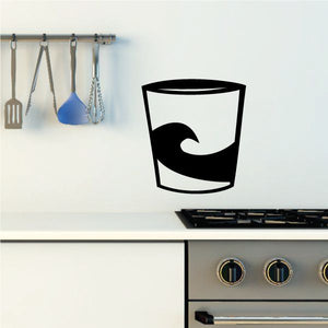 White mug with black wave decal and thick black rim