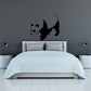 Curious panda decal sticker with black panda and playful tail, wall decor