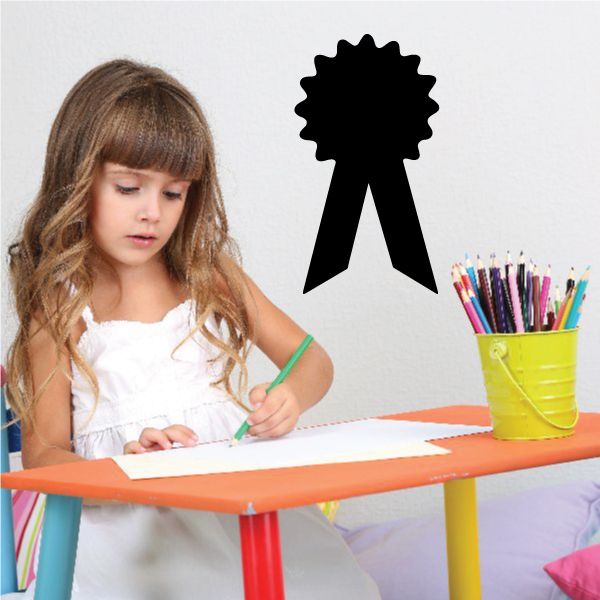 Black prize ribbon decal with scalloped rosette and hanging tails silhouette