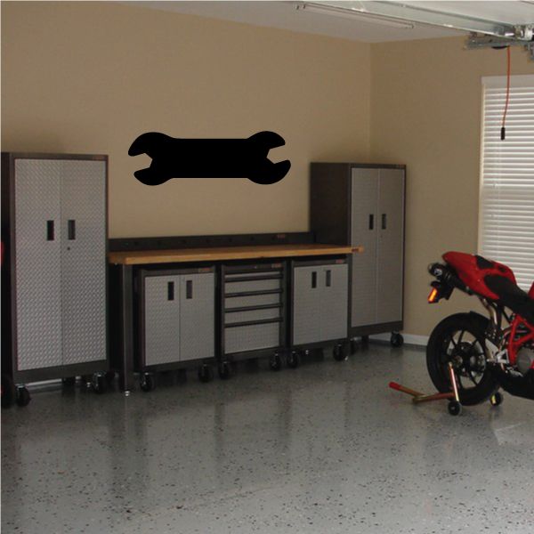 Black toy wrench wall decal with double-ended shape