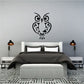 Tribal owl wall decal with swirling design, black