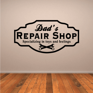 Vinyl wall decal with 'Dad's Repair Shop' text and toys & feelings lettering