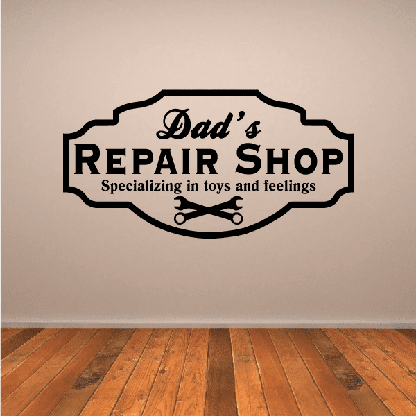 Vinyl wall decal with 'Dad's Repair Shop' text and toys & feelings lettering