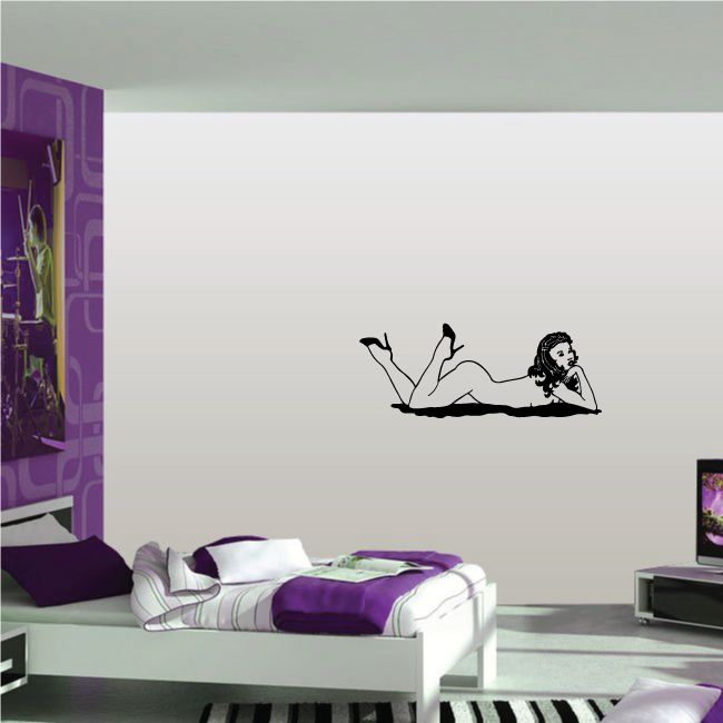 Wall decal of a reclining woman with dark hair in high heels
