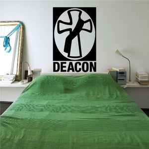 Deacon decal featuring a white cross in a circle with the word “DEACON” on black background
