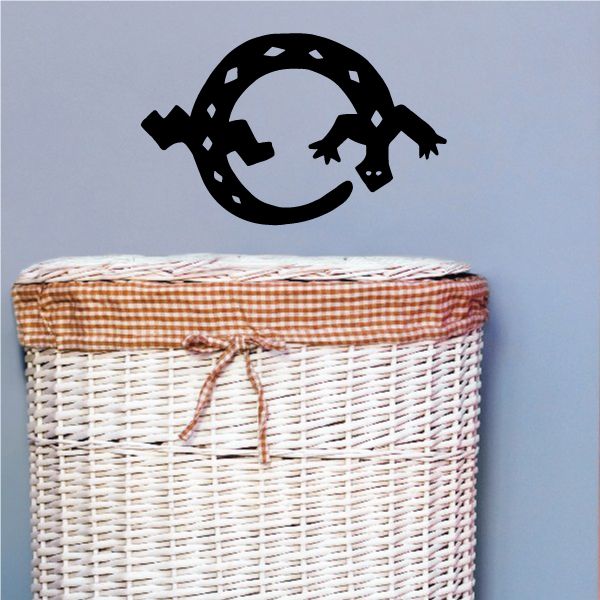Southwestern desert lizard vinyl decal: black circular emblem with lizard head and white speckles