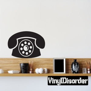 Black rotary telephone decal with circular dial icon