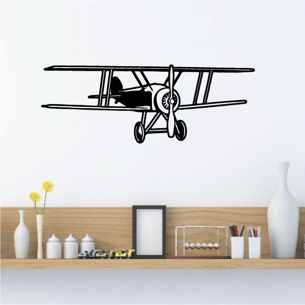 Black biplane wall decal with detailed aircraft design and propeller