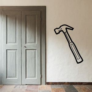 Claw hammer wall decal with black outline and light gray handle