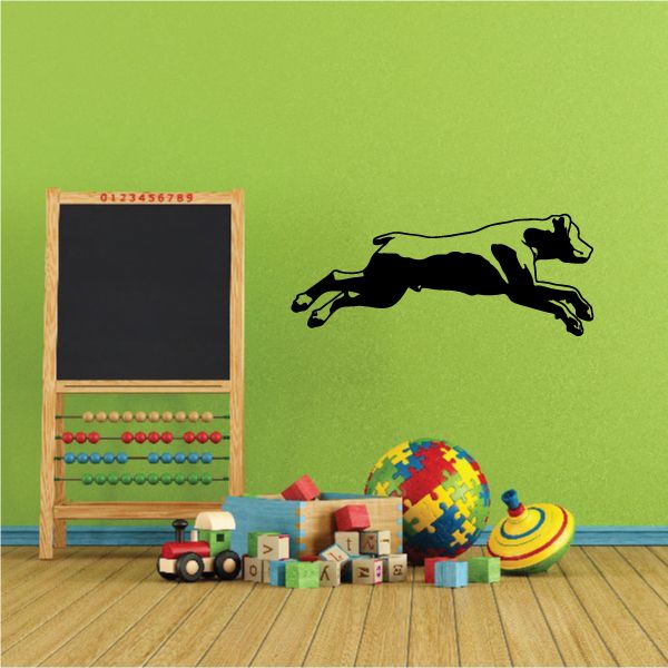 Black rottweiler diving decal with detailed silhouette, running forward
