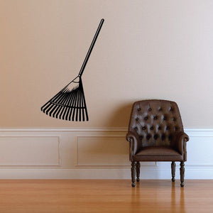 Black gardening rake decal with long handle and fan-shaped head