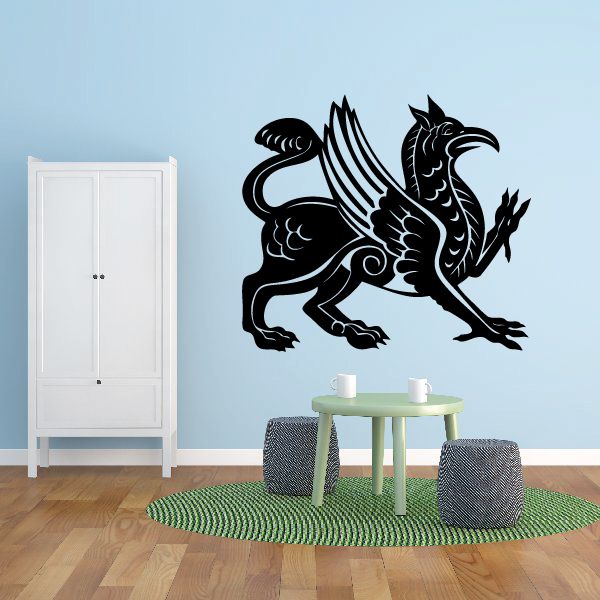 Black detailed griffin wall decal with wings spread and tail curled.